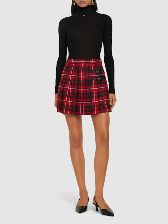 Alessandra Rich - Jupe courte en laine tartan à plis avec boucles