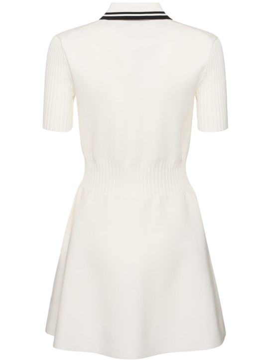 Tory Sport: Robe polo courte en maille technique