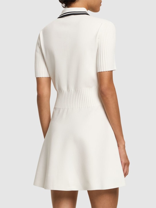 Tory Sport: Robe polo courte en maille technique
