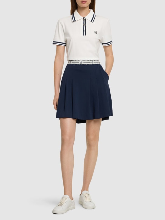 Tory Sport: Minigonna in nylon plissé con logo