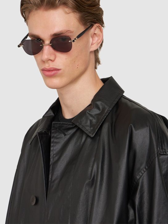 Kuboraum Berlin: Lunettes de soleil rondes asymétriques P61