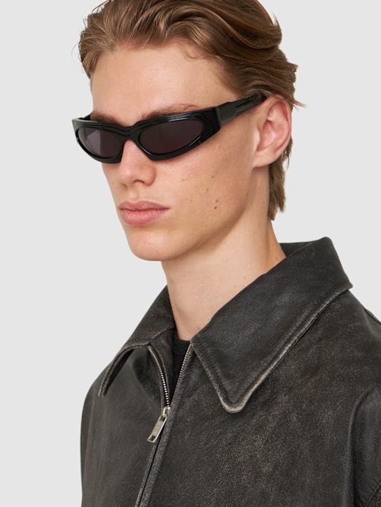 Kuboraum Berlin: Lunettes de soleil rondes en acétate E21