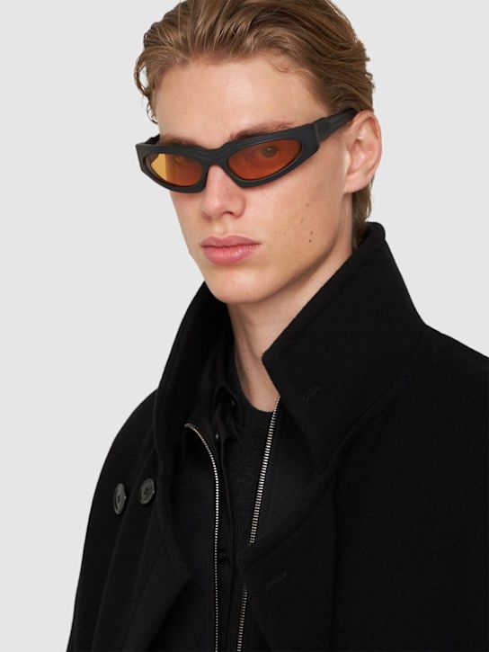 Kuboraum Berlin: Lunettes de soleil rondes en acétate E21