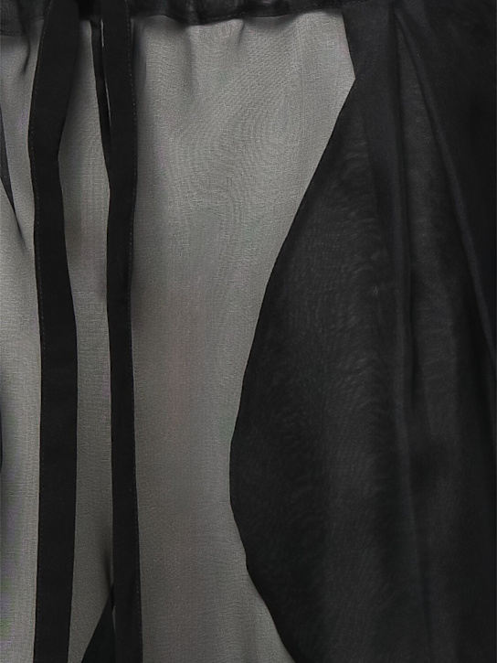 Khaite: Pantaloni Trenton in organza di seta stretch