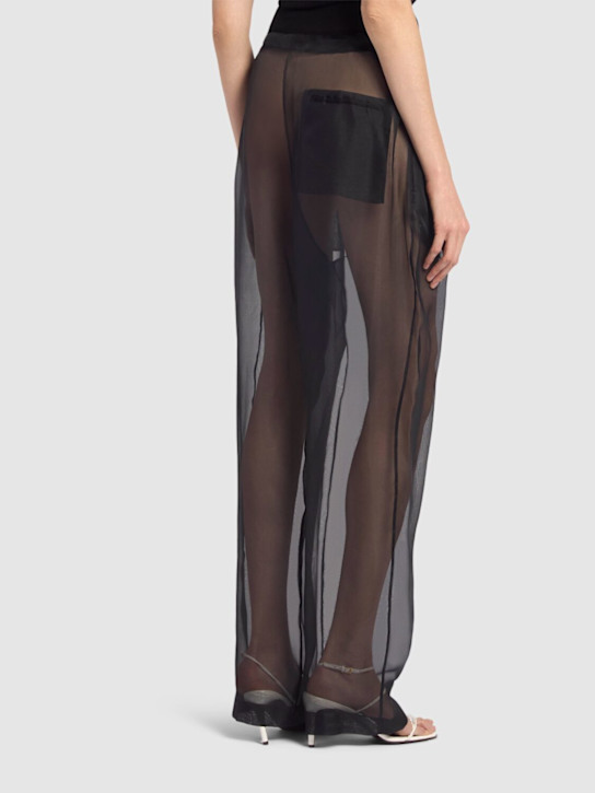 Khaite: Pantaloni Trenton in organza di seta stretch