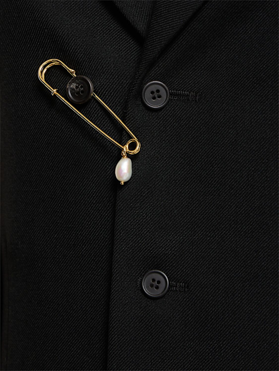 Carven: Abrigo midi de lana con pins