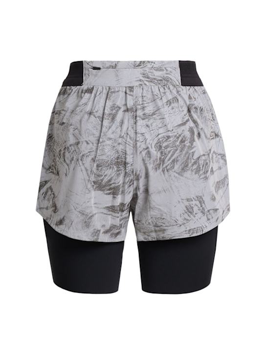 Nike: Shorts de running Swift réfléchissants