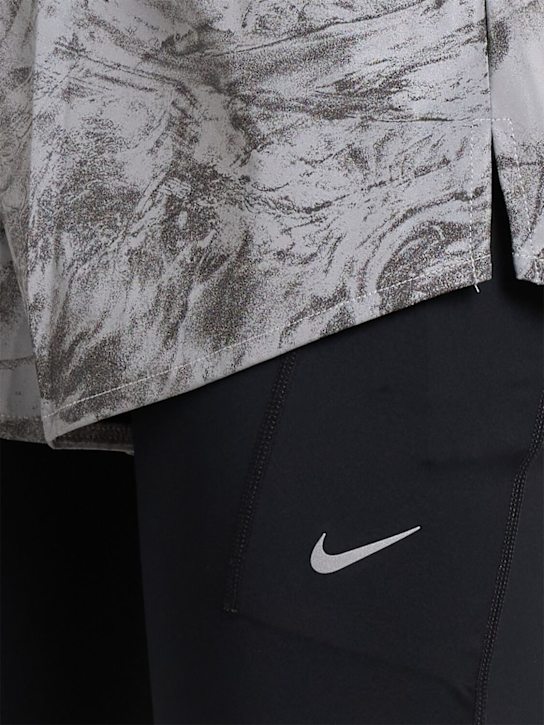 Nike: Shorts de running Swift réfléchissants
