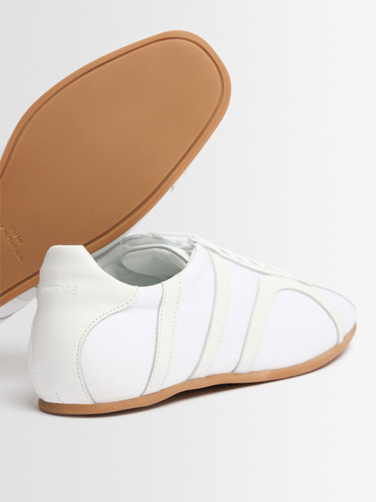 Toteme: Sneakers altas de lona con cordones