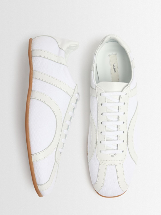 Toteme: Sneakers altas de lona con cordones