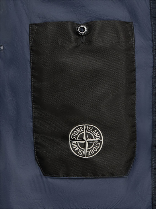 Stone Island: Parka courte en nylon matelassé duvet