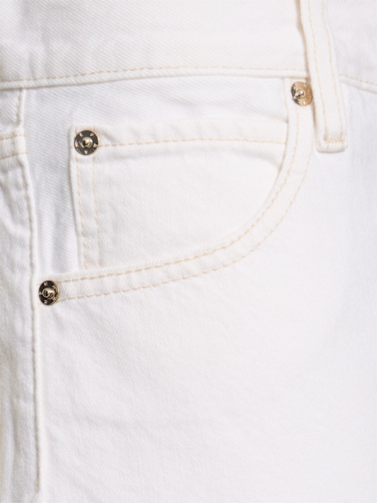 Frame: Shorts de denim de algodón