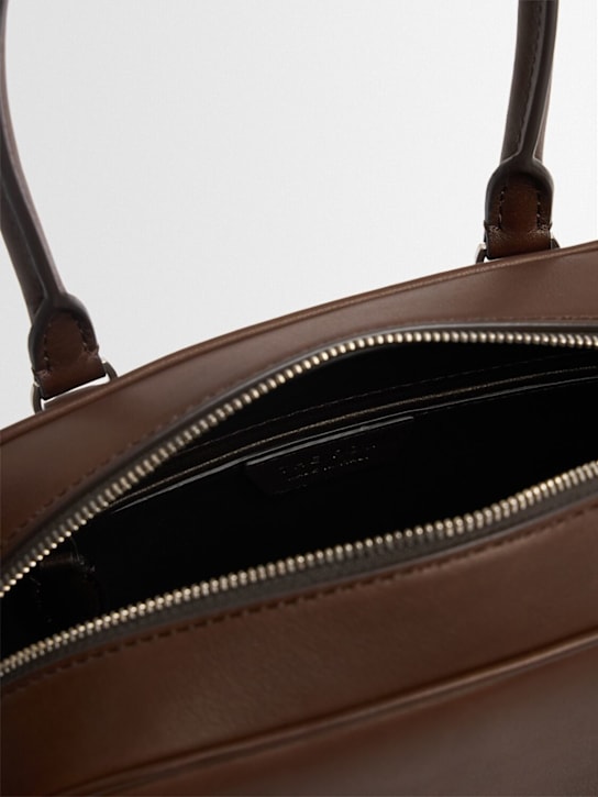 The Row: India 10 saddle leather top handle bag