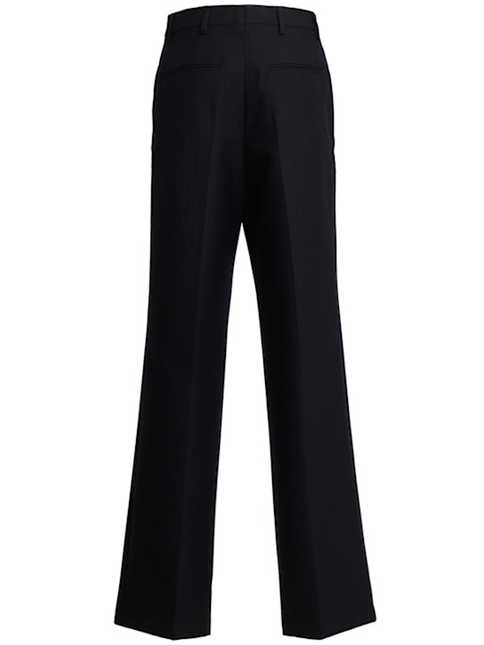 Dries Van Noten: Wide-leg trousers with pleats