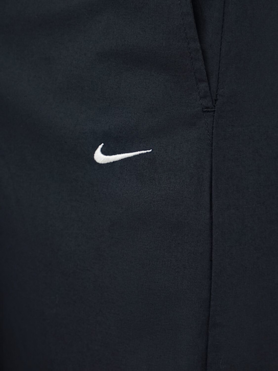 Nike: Jupe longue Chill en popeline