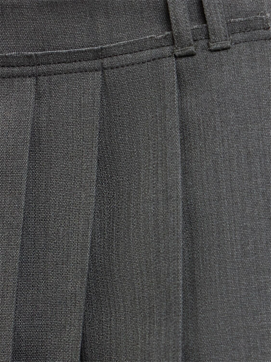 Acne Studios: Mini-jupe en laine mélangée à plis