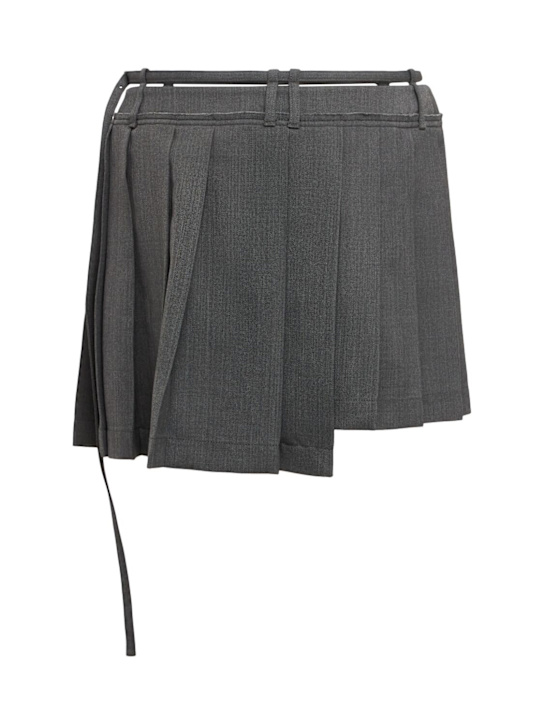 Acne Studios: Mini-jupe en laine mélangée à plis