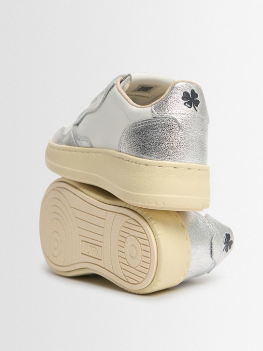 Autry: Low sneakers Kidstripes in leather with strap
