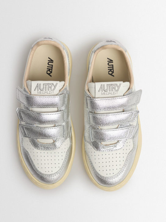 Autry: Low sneakers Kidstripes in leather with strap