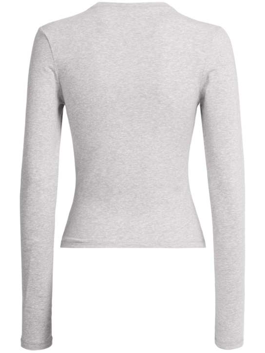 SKIMS: T-shirt en jersey de coton à manches longues