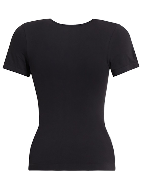 SKIMS: Seamless soft nylon t-shirt