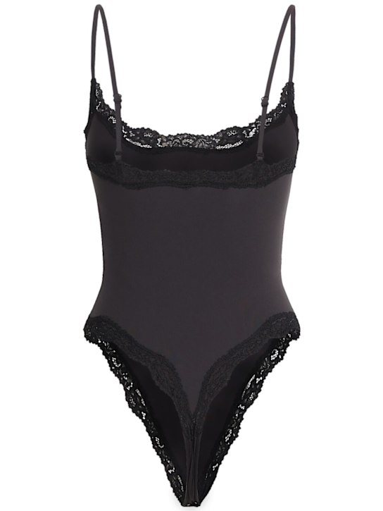 SKIMS: Fits everybody nylon bodysuit w/ lace