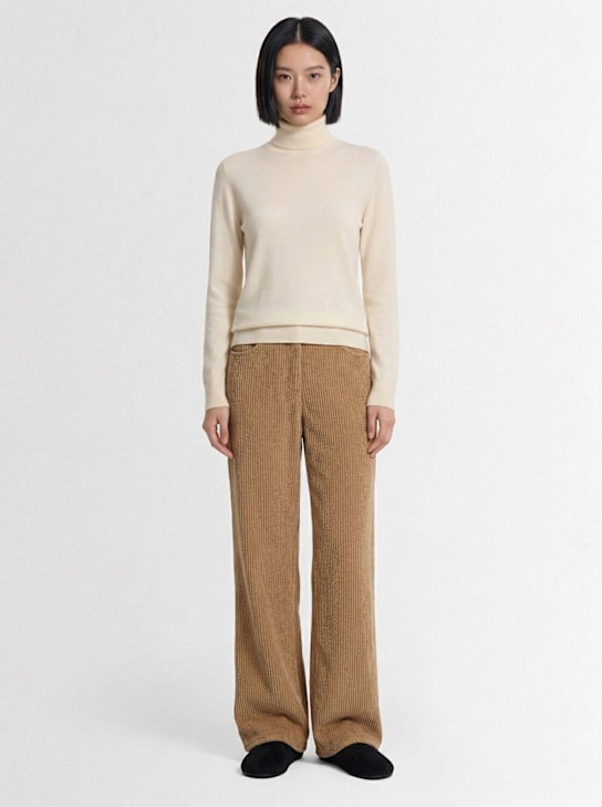 The Row: Pull col roulé en cachemire tricoté Lizzie