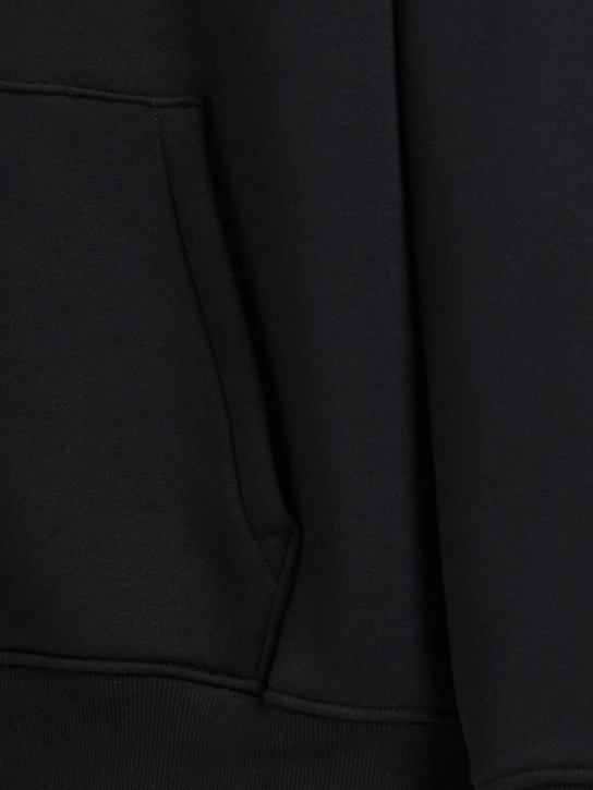 SKIMS: Sweat à capuche