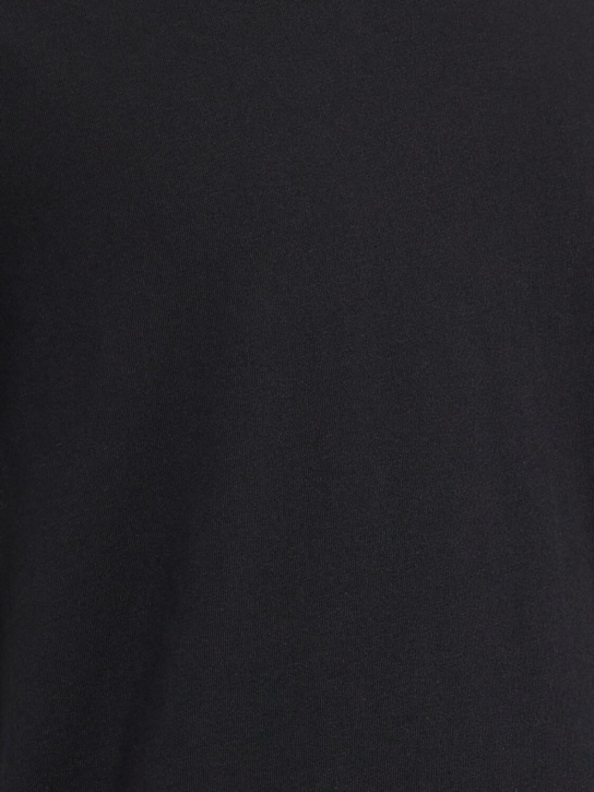 SKIMS: Camiseta de algodón