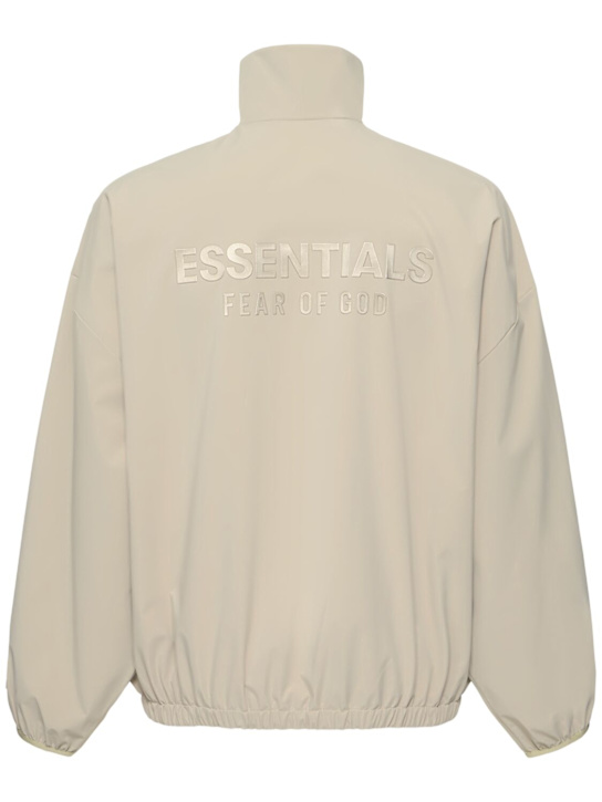 Fear of God ESSENTIALS: Sweat-shirt à demi-zippé en nylon Sporty