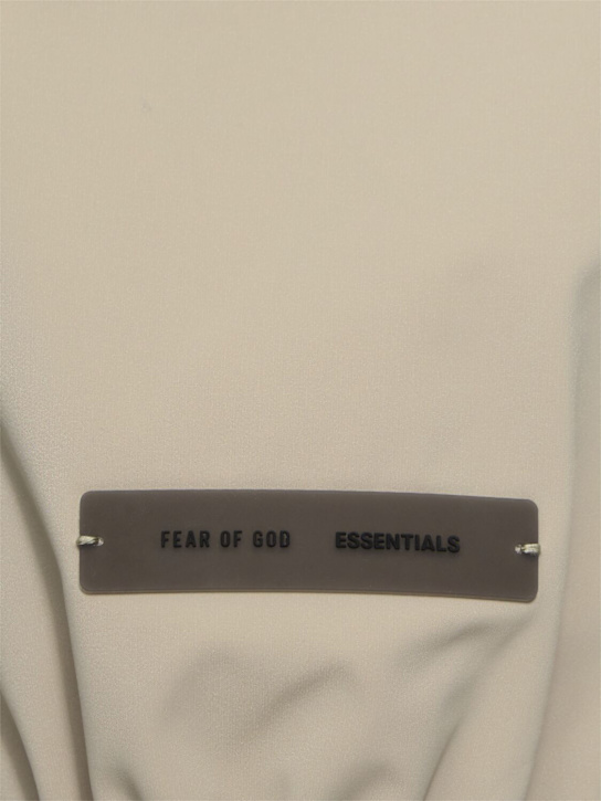 Fear of God ESSENTIALS: Sweat-shirt à demi-zippé en nylon Sporty