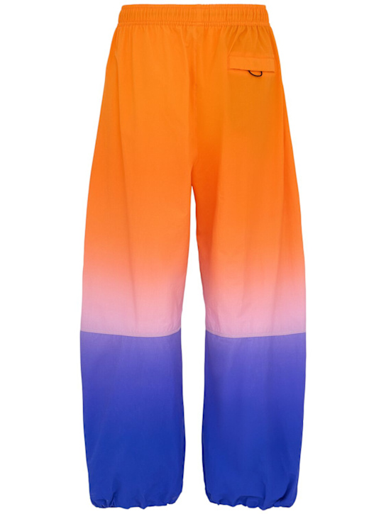 Nike: Pantaloni in techno