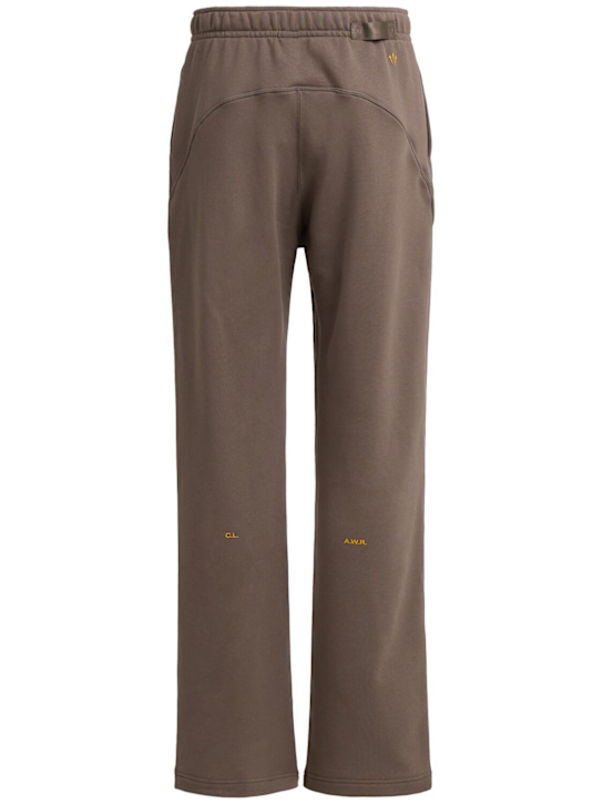 Nike: Pantaloni dritti Nocta in pile
