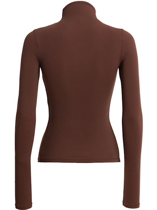 SKIMS: Nylon blend turtleneck top