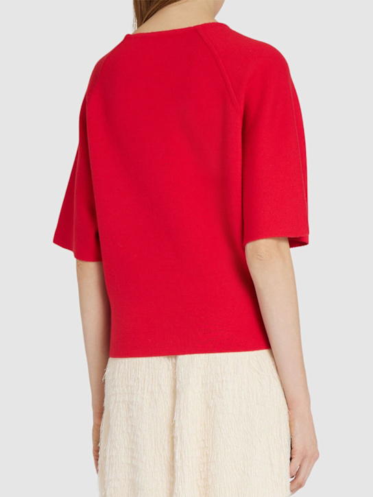 Khaite: Maglia Warren a maniche corte in lana