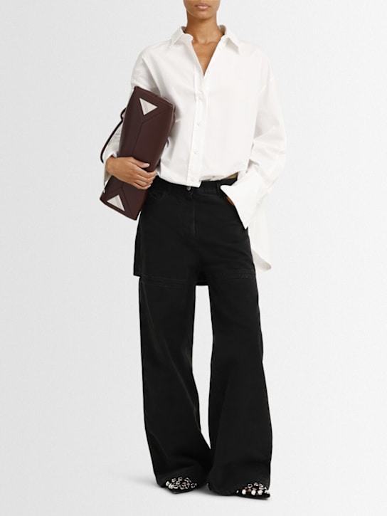 The Attico - Jeans ampi in tela washed con cutout