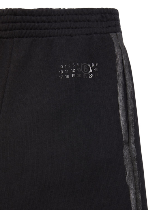 MM6 Maison Margiela: Printed cotton sweatpants