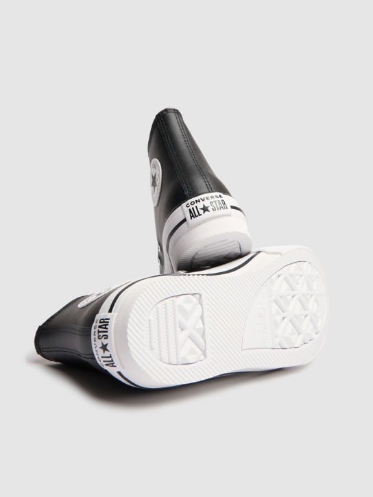 Converse: Chuck Taylor leather sneakers