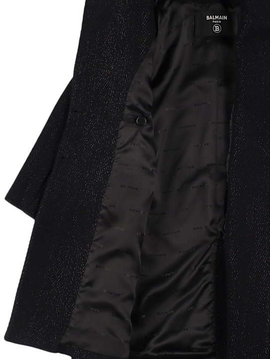 Balmain: Wool blend coat