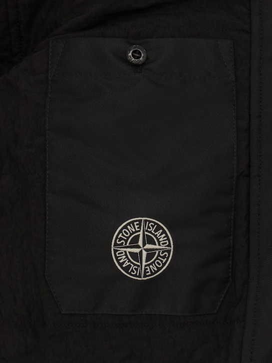 Stone Island: Leather zip-up hooded jacket
