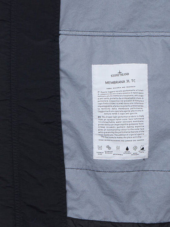Stone Island: Logo patch nylon short parka
