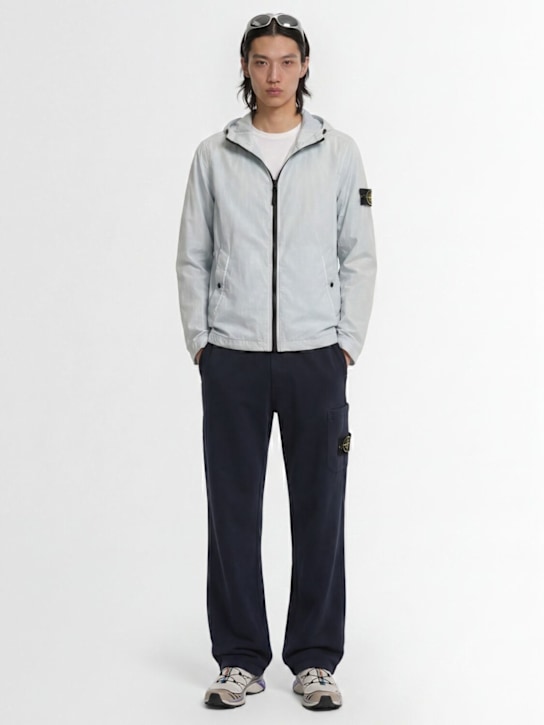 Stone Island: Logo patch nylon zip-up hooded jacket