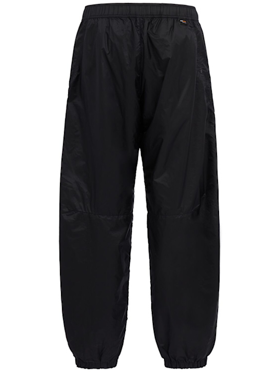 Stone Island: Logo nylon loose pants