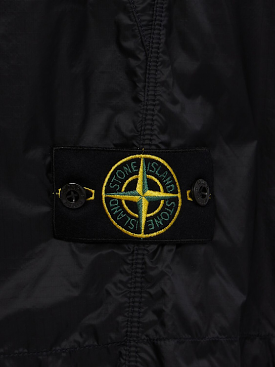 Stone Island: Logo nylon loose wide shorts