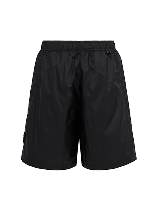 Stone Island: Logo nylon loose wide shorts