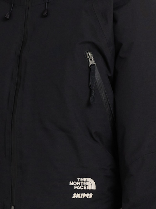The North Face: SKIMS cropped insulated jacket