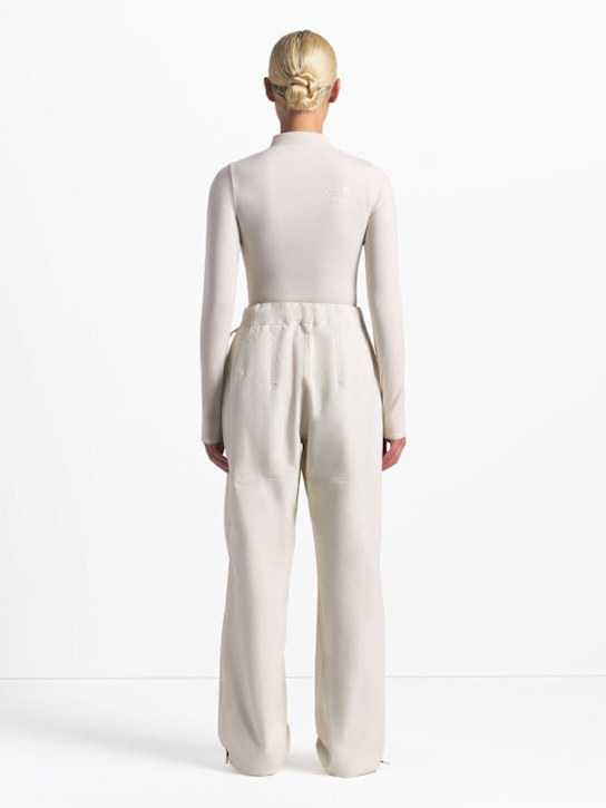 The North Face: SKIMS taped seam pants