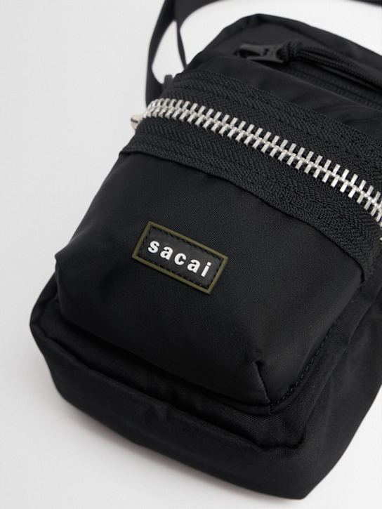 Sacai: Pocket pouch crossbody bag
