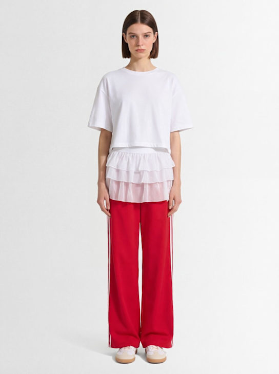 adidas Originals: Adilenium Firebird track pants