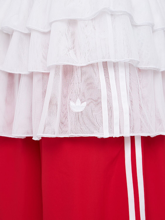 adidas Originals: Adilenium Firebird track pants